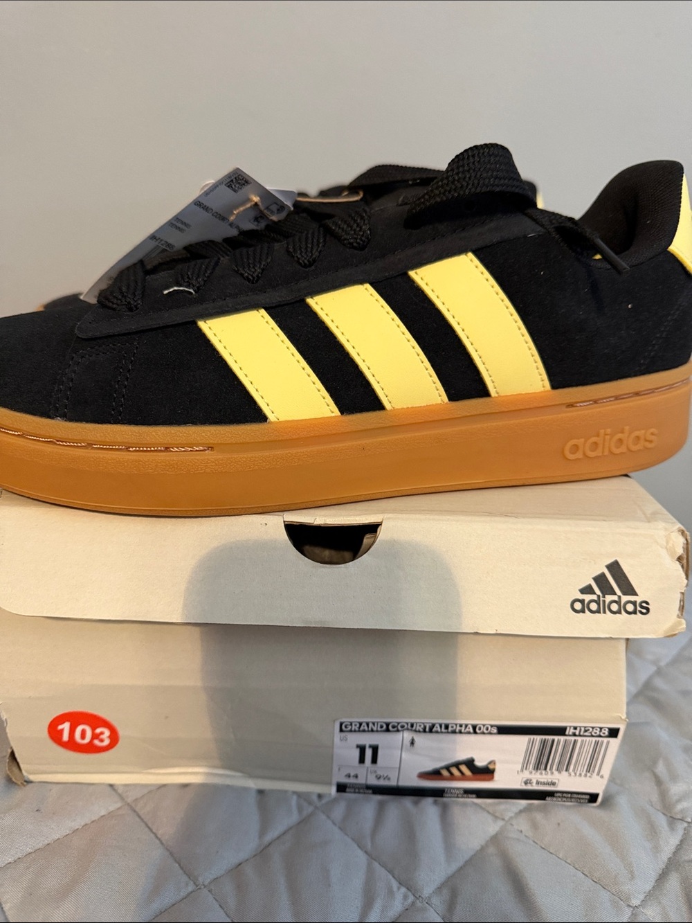 adidas Women’s Black Suede Sneakers with Yellow Stripes and Gum Sole